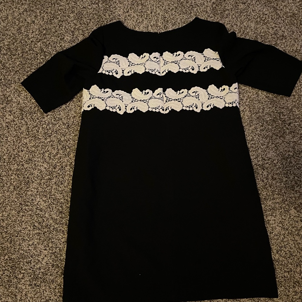 Black Maggy London Dress with white lace details.